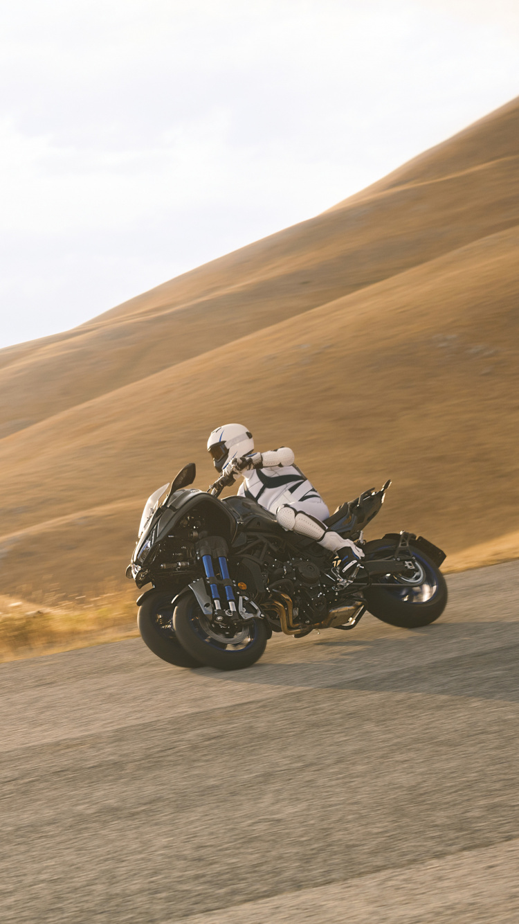 Black Sports Bike on Road During Daytime. Wallpaper in 750x1334 Resolution