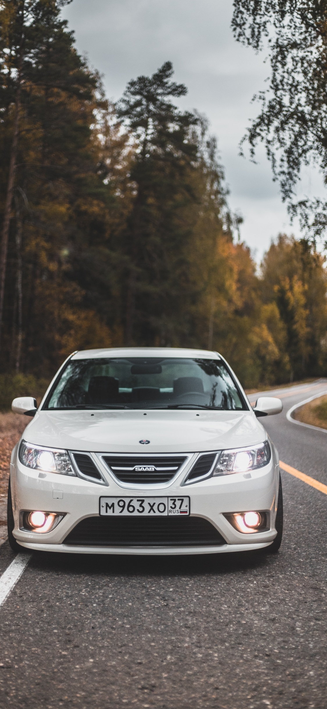 White Bmw Car on Road During Daytime. Wallpaper in 1125x2436 Resolution