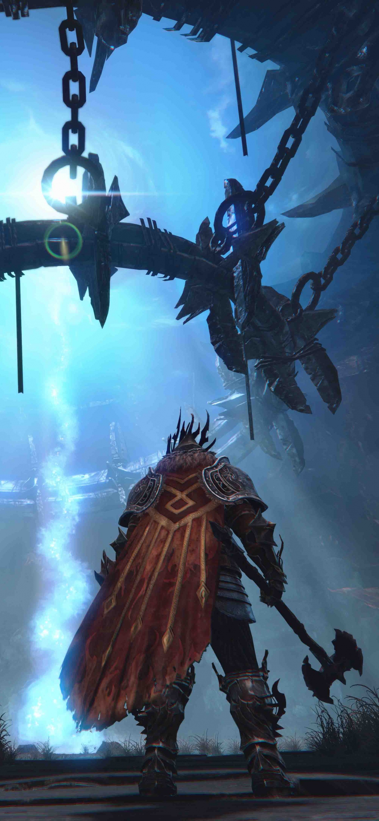 Mann im Schwarz-orangefarbenen Anzug Mit Schwarzem Gewehr. Wallpaper in 1242x2688 Resolution