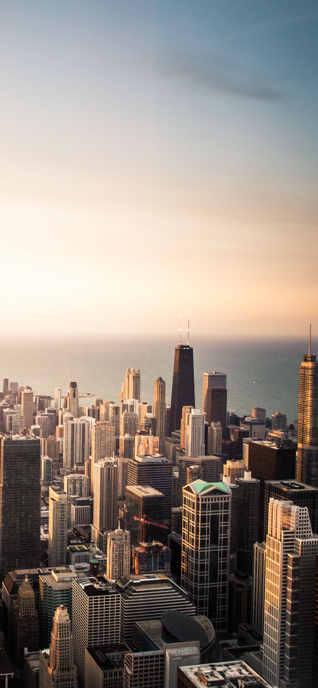Aerial View of City Buildings During Daytime. Wallpaper in 1242x2688 Resolution
