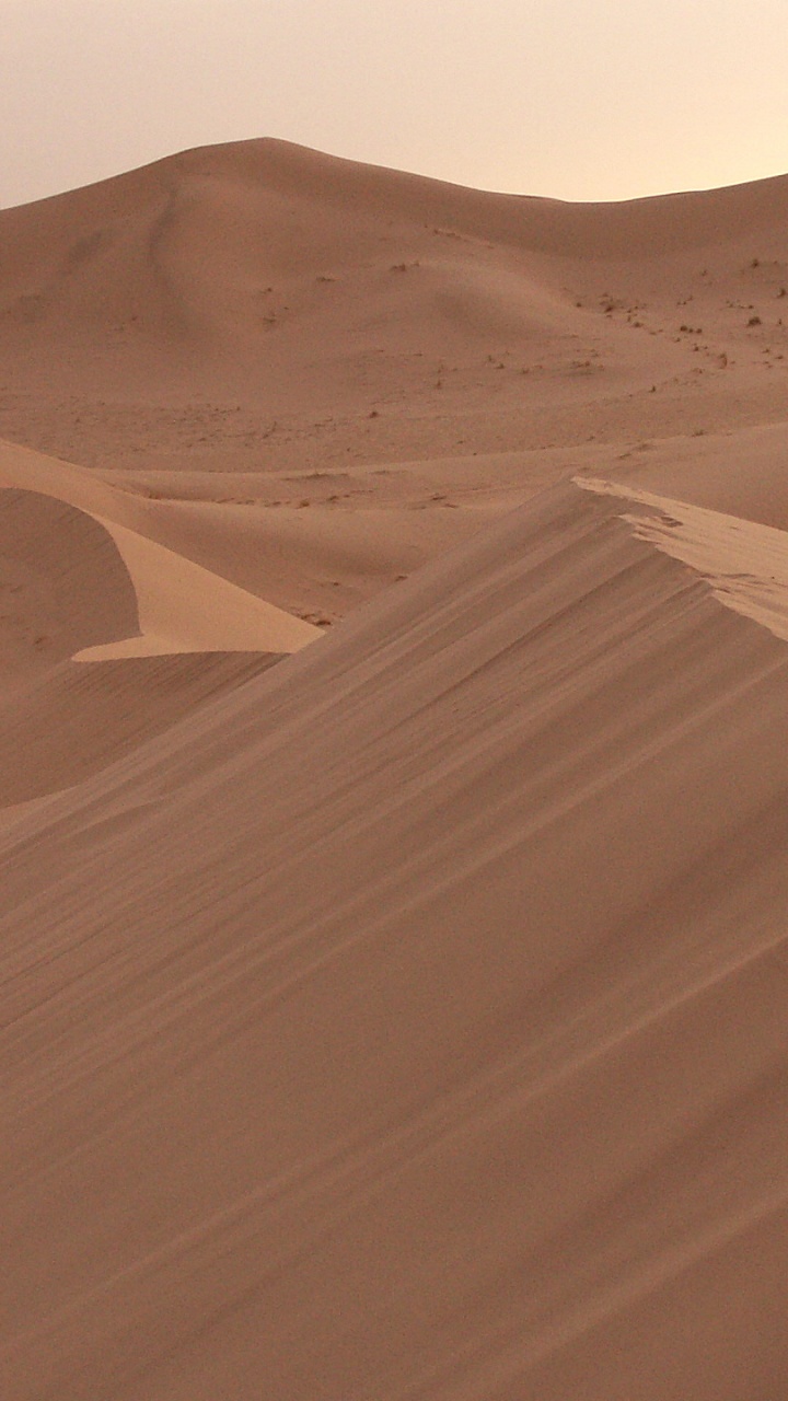 Brown Sand Dunes During Daytime. Wallpaper in 720x1280 Resolution