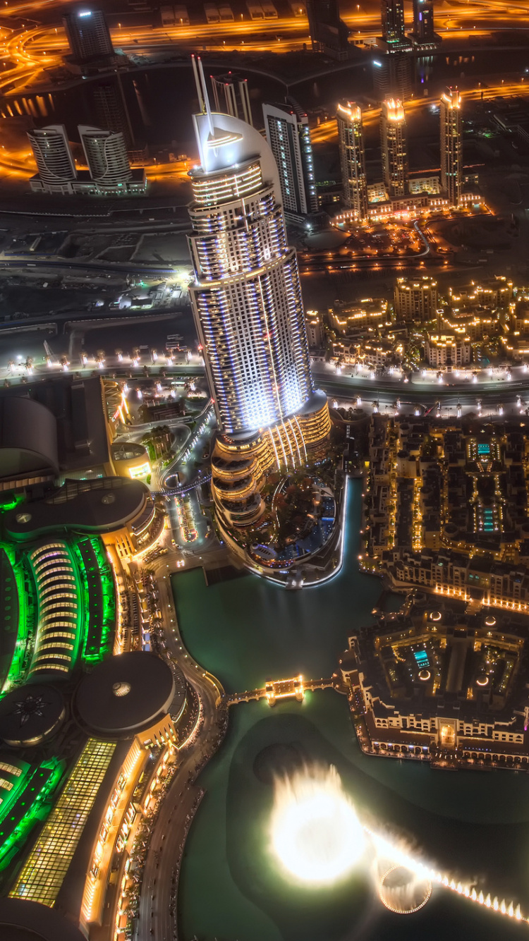 Vue Aérienne de la Ville Pendant la Nuit. Wallpaper in 750x1334 Resolution