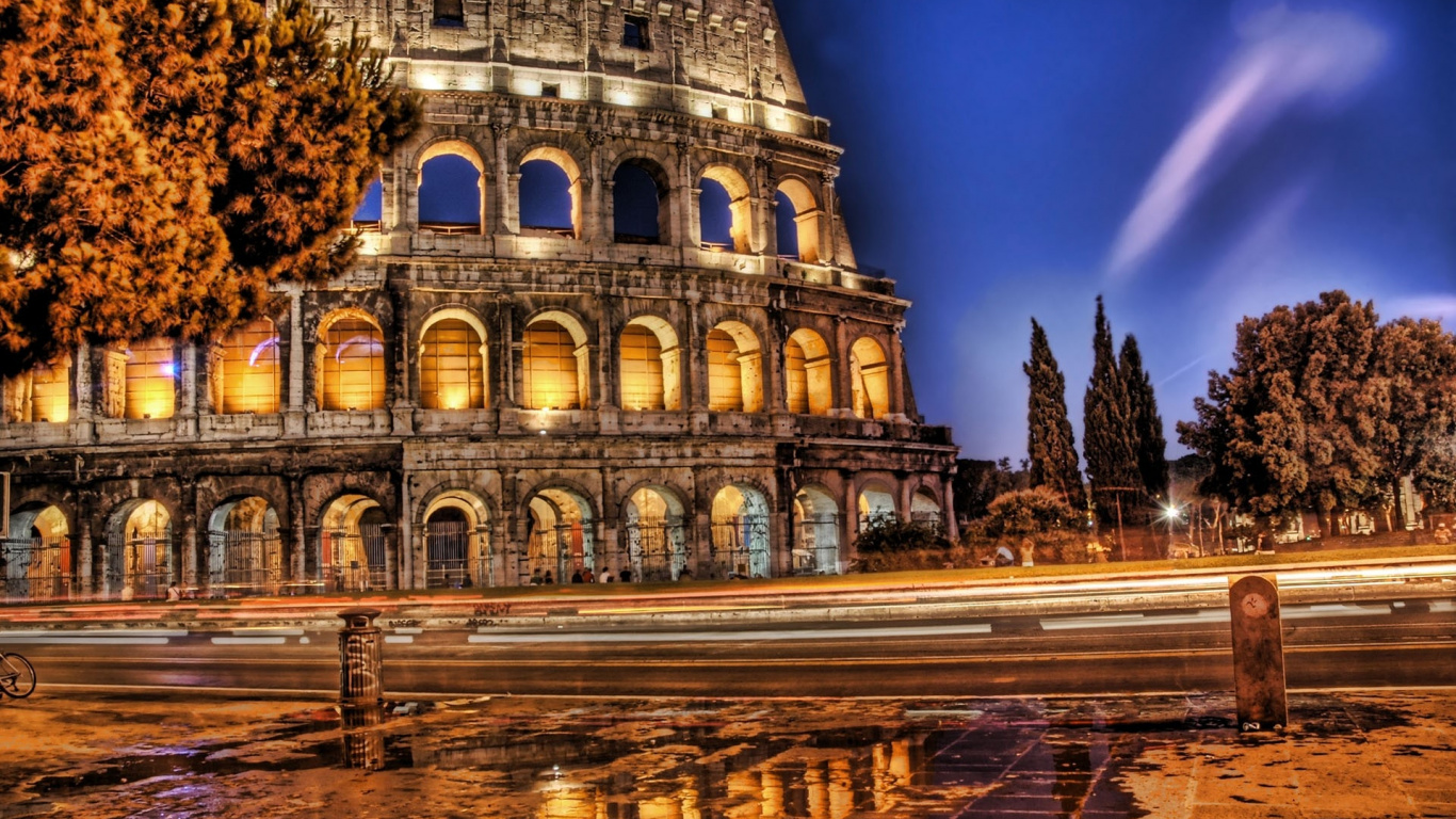 Brown Concrete Building During Night Time. Wallpaper in 1366x768 Resolution