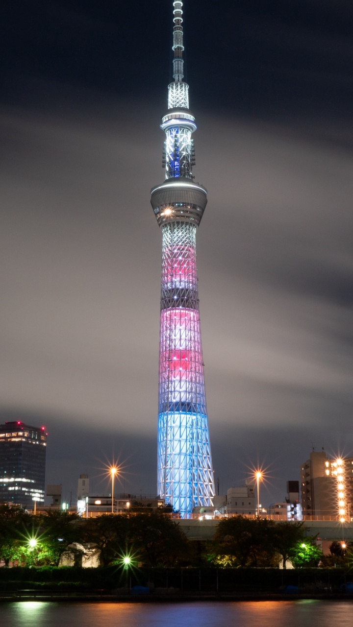 Lighted Tower During Night Time. Wallpaper in 720x1280 Resolution