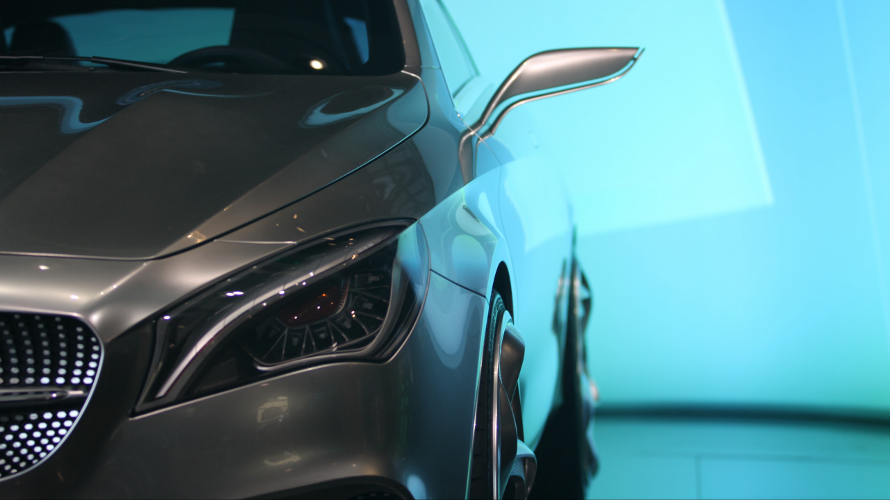 Black Car With Chrome Steering Wheel. Wallpaper in 1280x720 Resolution