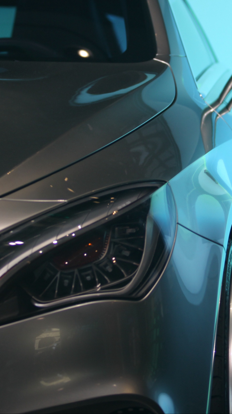 Black Car With Chrome Steering Wheel. Wallpaper in 750x1334 Resolution