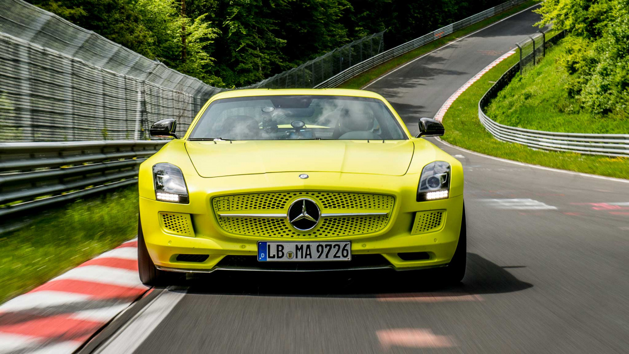 Yellow Mercedes Benz Car on Road During Daytime. Wallpaper in 1280x720 Resolution