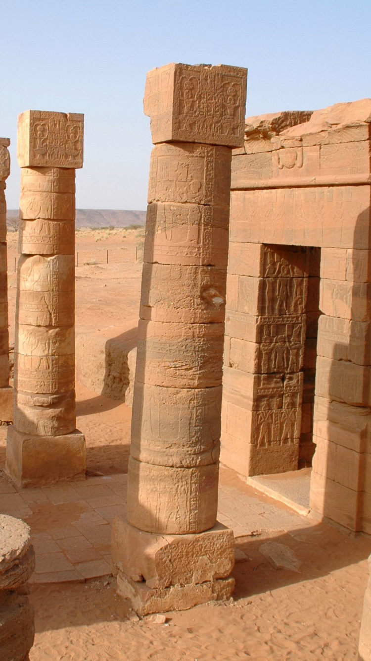 Brown Concrete Pillars During Daytime. Wallpaper in 750x1334 Resolution
