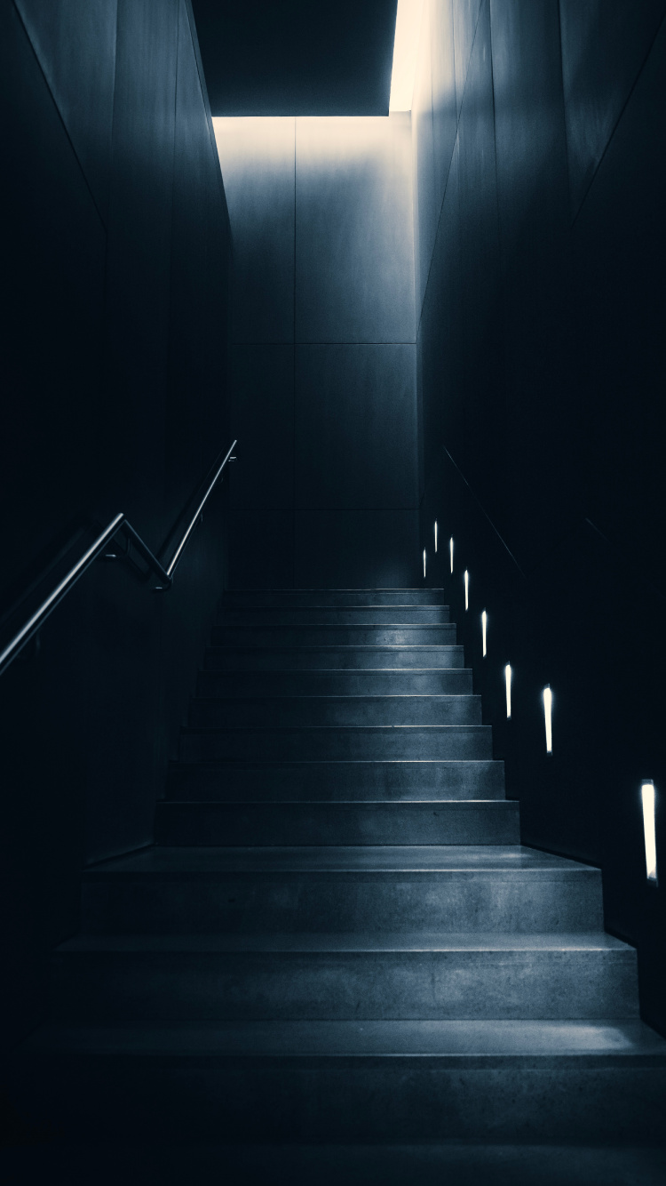 Gray Concrete Staircase With Black Metal Railings. Wallpaper in 750x1334 Resolution