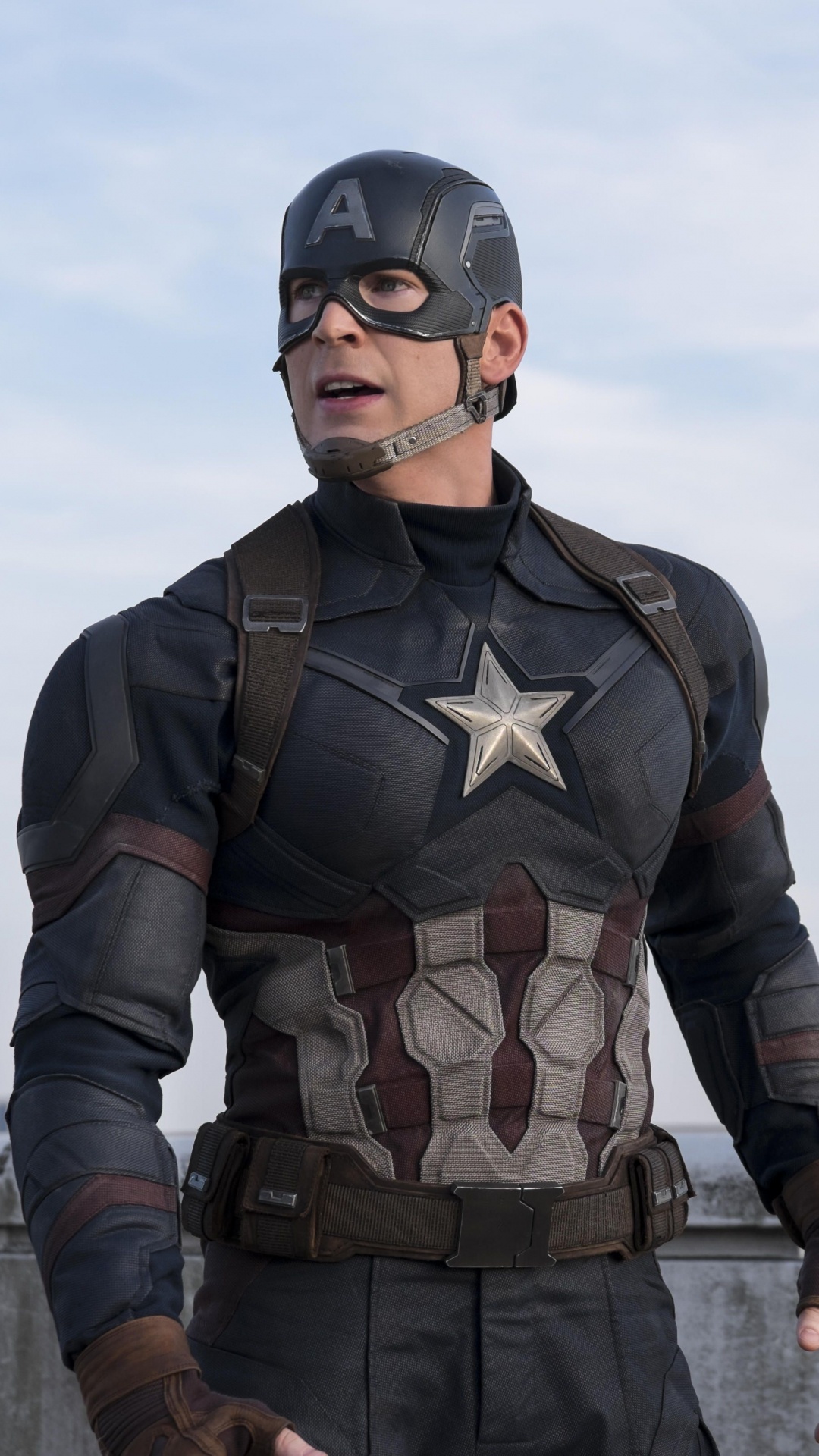 Mann in Schwarz-braunem Tarnanzug, Der Tagsüber Auf Dem Dock Steht. Wallpaper in 1080x1920 Resolution