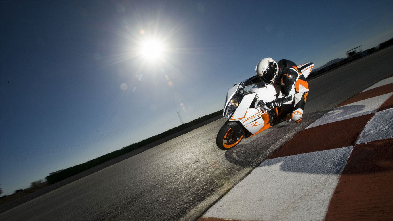 Man Riding on Black and White Sports Bike. Wallpaper in 1366x768 Resolution