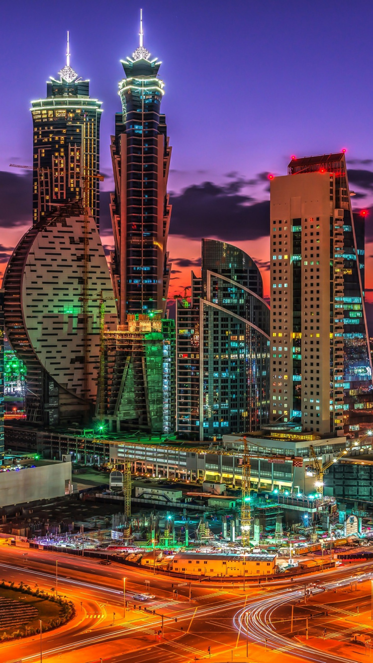 City Buildings With Lights During Night Time. Wallpaper in 750x1334 Resolution