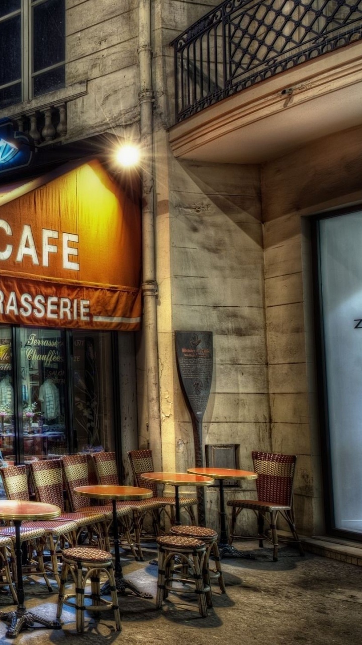 People Sitting on Chair Outside Restaurant During Daytime. Wallpaper in 720x1280 Resolution