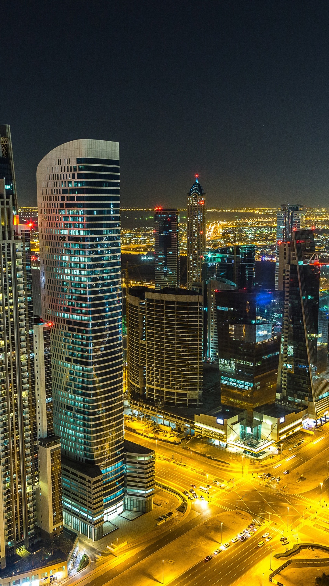 City Buildings During Night Time. Wallpaper in 1080x1920 Resolution