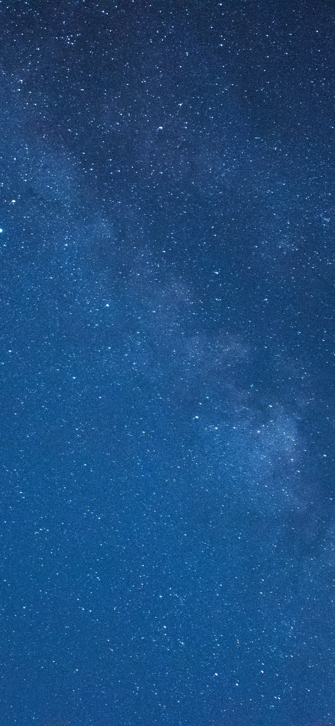 Blauer Himmel Mit Sternen Während Der Nacht. Wallpaper in 1125x2436 Resolution