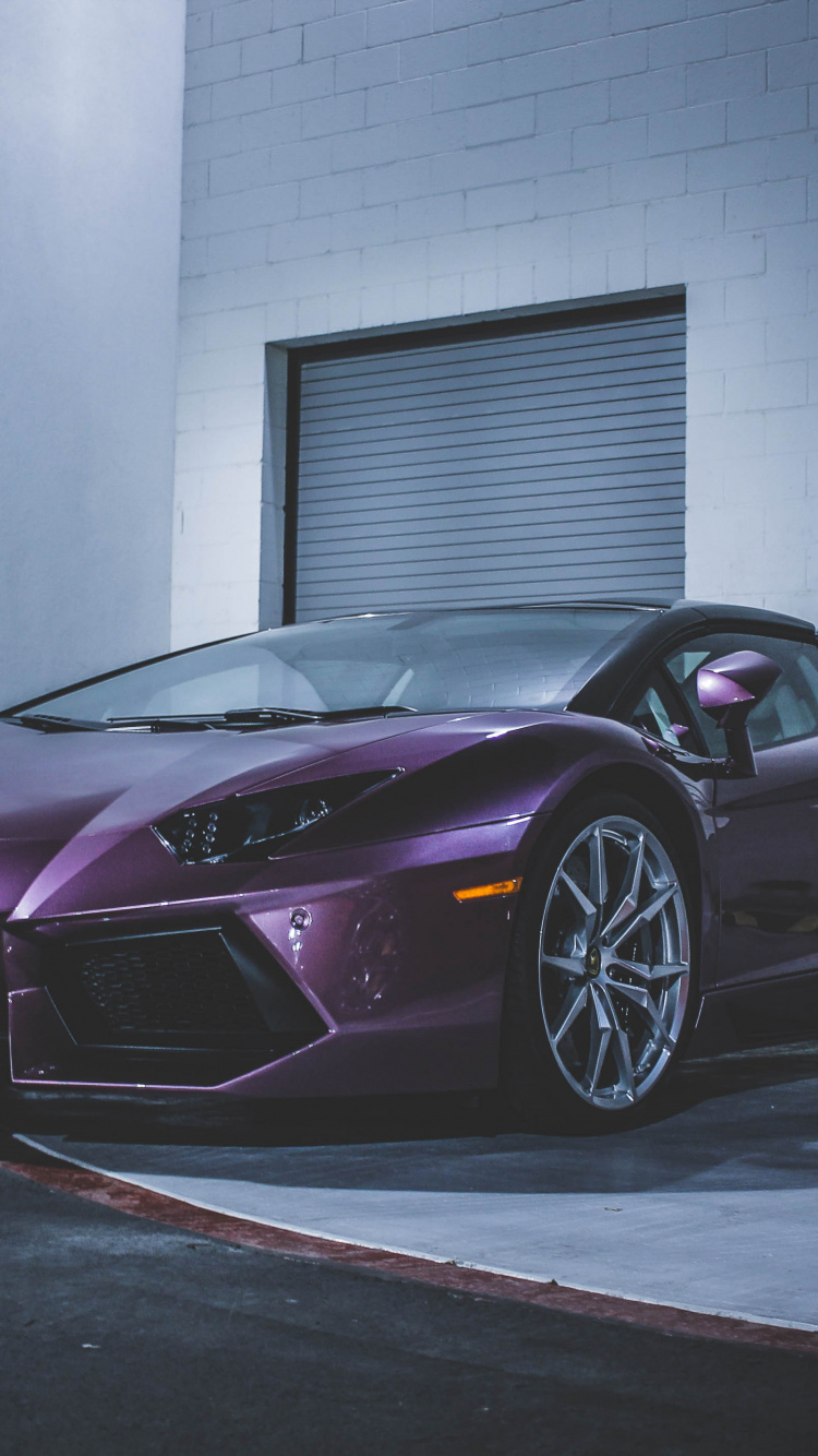 Purple Ferrari 458 Italia Parked Near White Wall. Wallpaper in 750x1334 Resolution