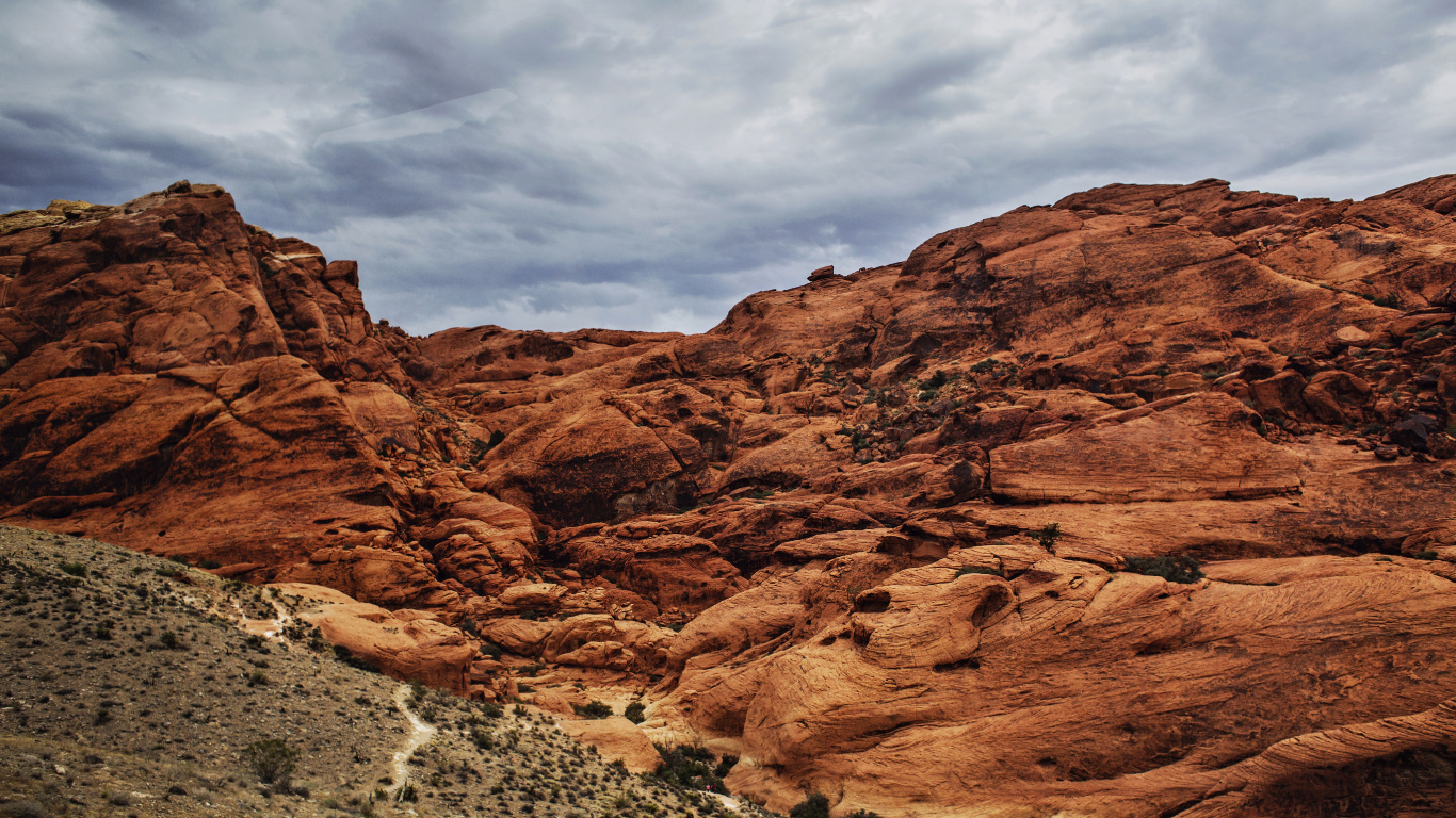 Brown Rocky Mountain Under Cloudy Sky During Daytime. Wallpaper in 1366x768 Resolution