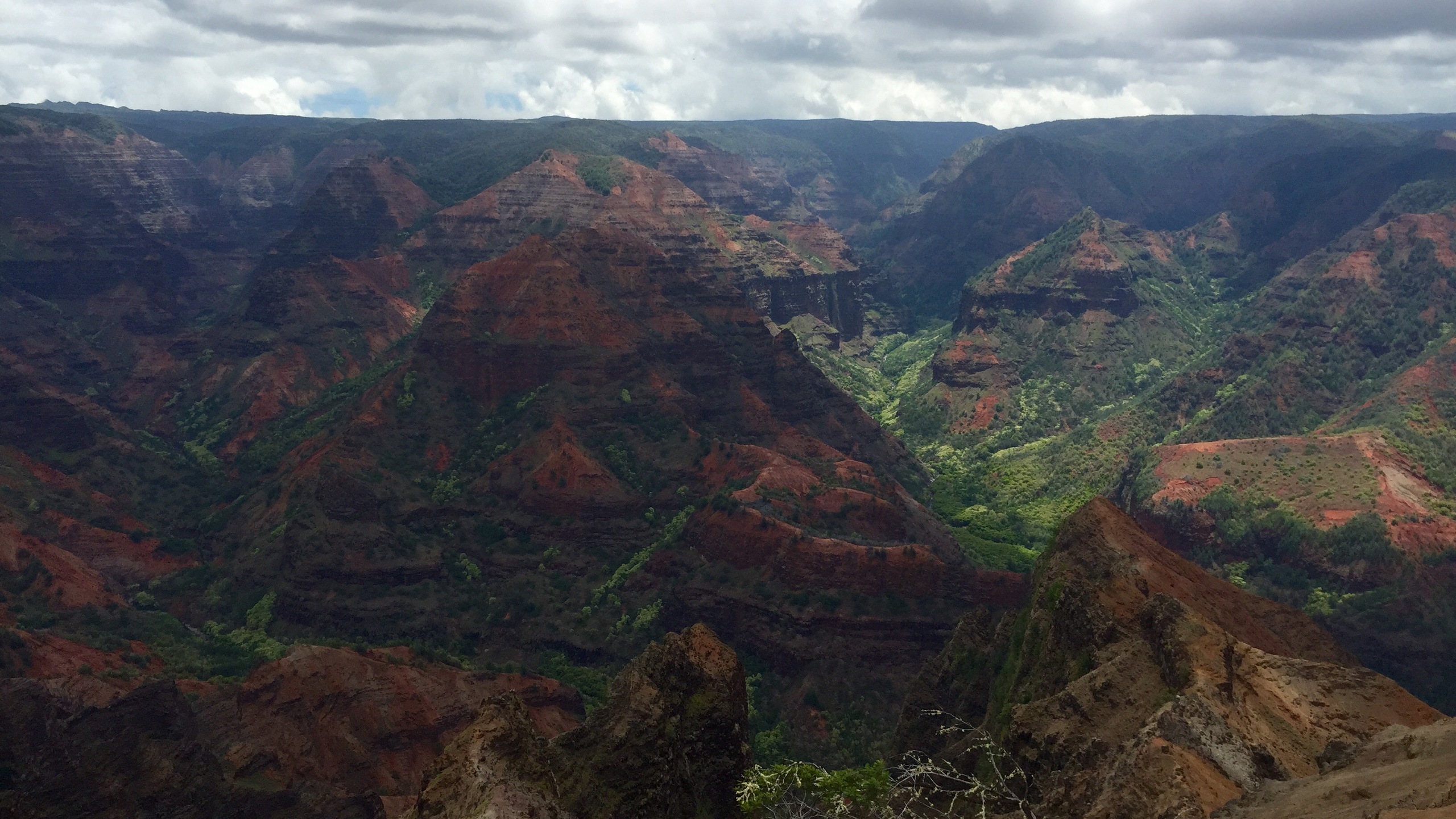 Green and Brown Mountains Under White Cloudy Sky During Daytime. Wallpaper in 2560x1440 Resolution