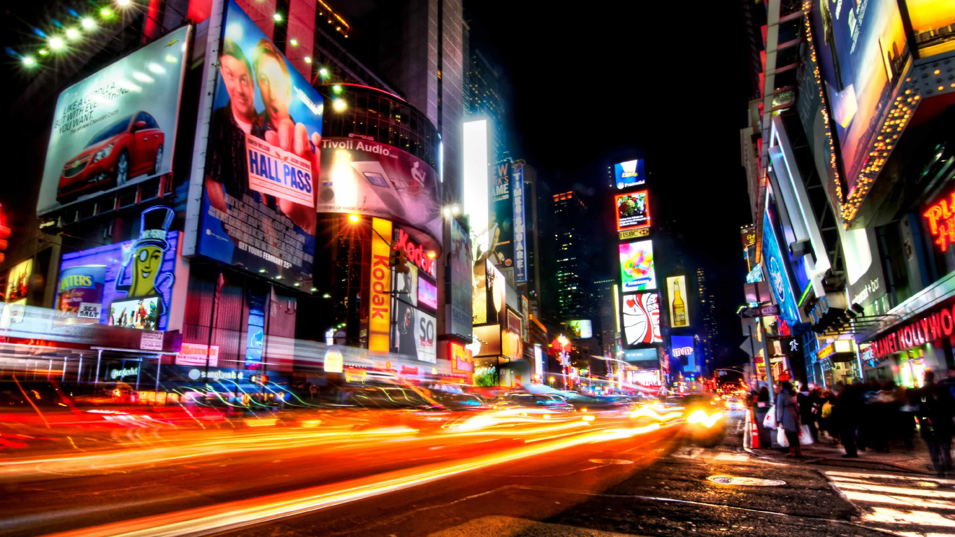 Cars on Road Near Buildings During Night Time. Wallpaper in 1366x768 Resolution
