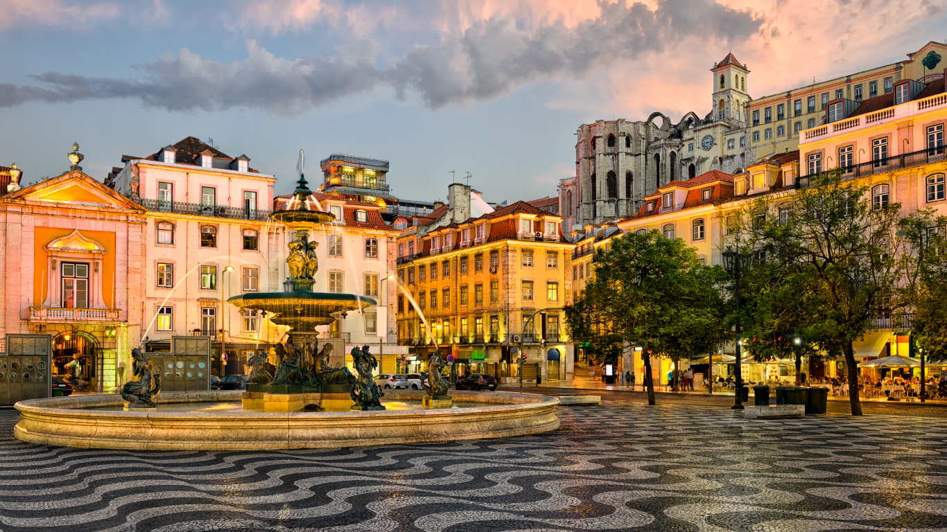 People Walking on Park Near Building During Daytime. Wallpaper in 1366x768 Resolution