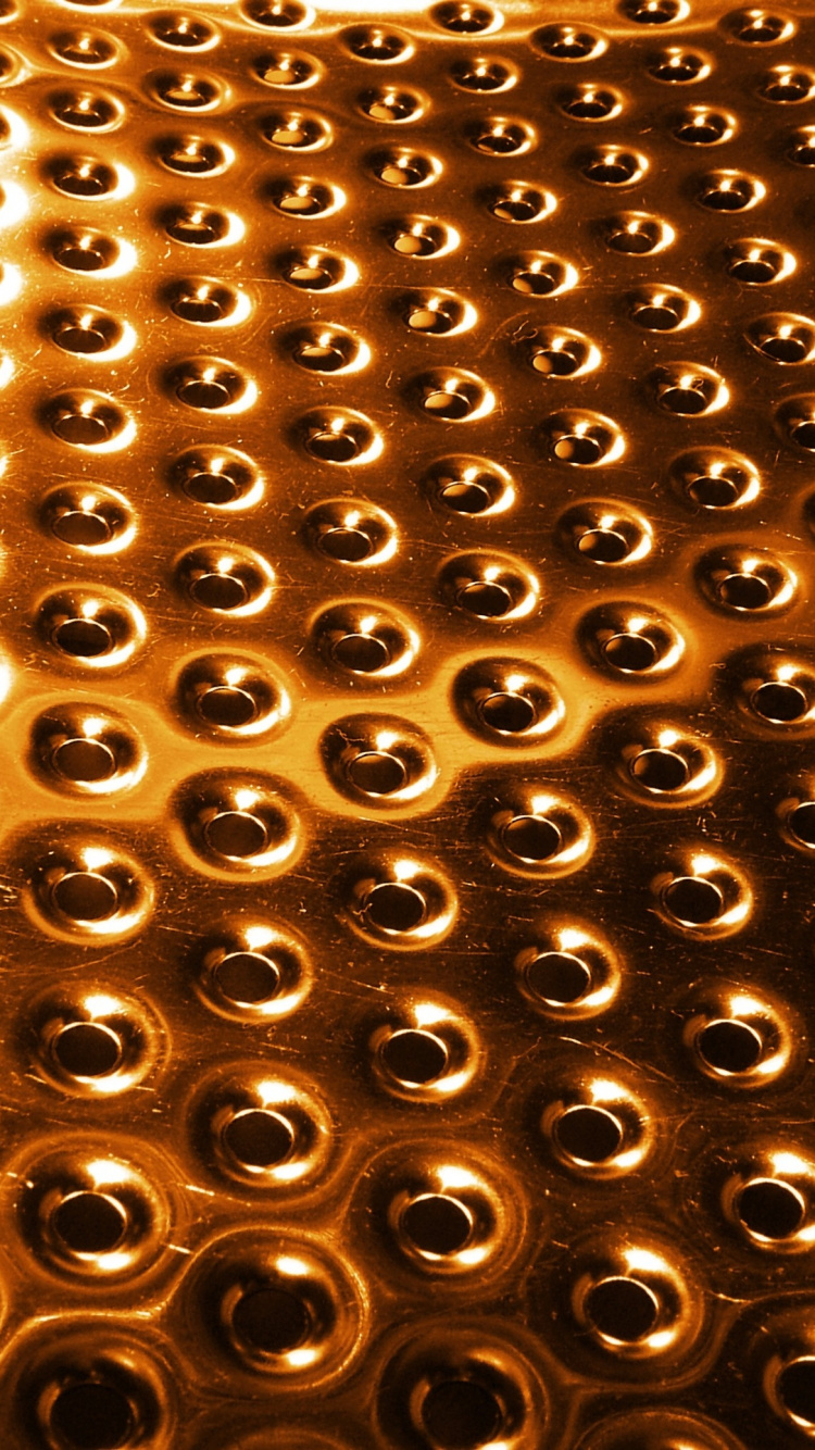 Black and Gold Studded Textile. Wallpaper in 750x1334 Resolution
