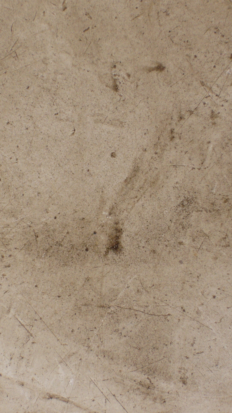 Person Wearing Black Shoes Standing on Brown Concrete Floor. Wallpaper in 750x1334 Resolution