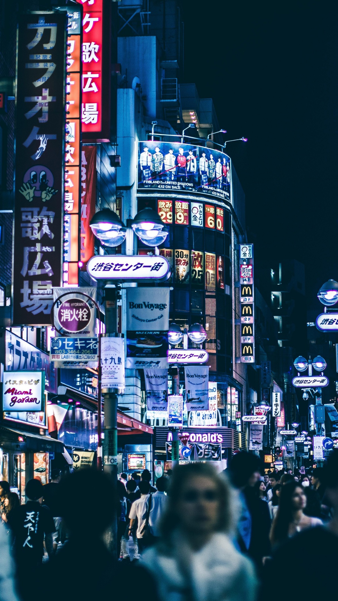 People Walking on Street During Night Time. Wallpaper in 1080x1920 Resolution