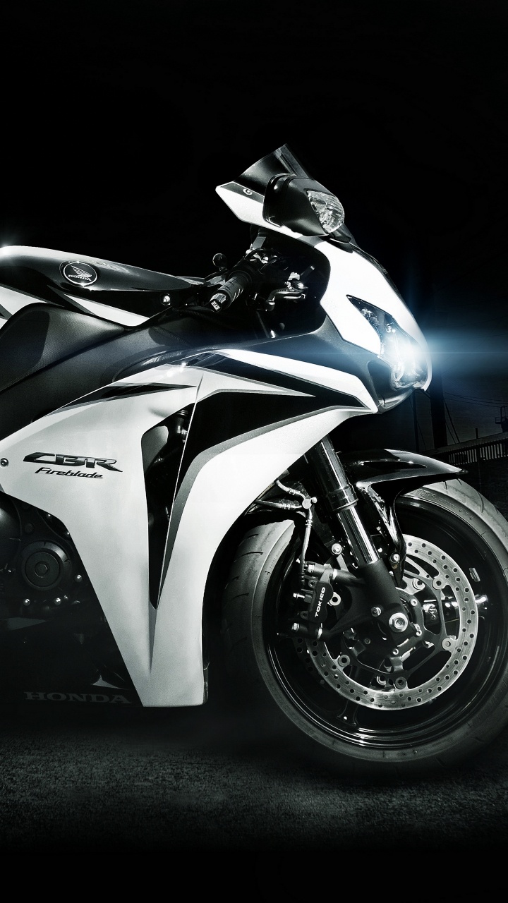 White and Black Sports Bike. Wallpaper in 720x1280 Resolution