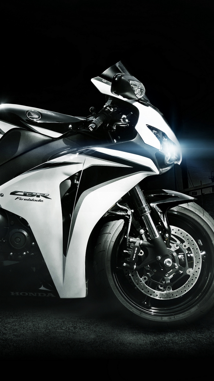White and Black Sports Bike. Wallpaper in 750x1334 Resolution