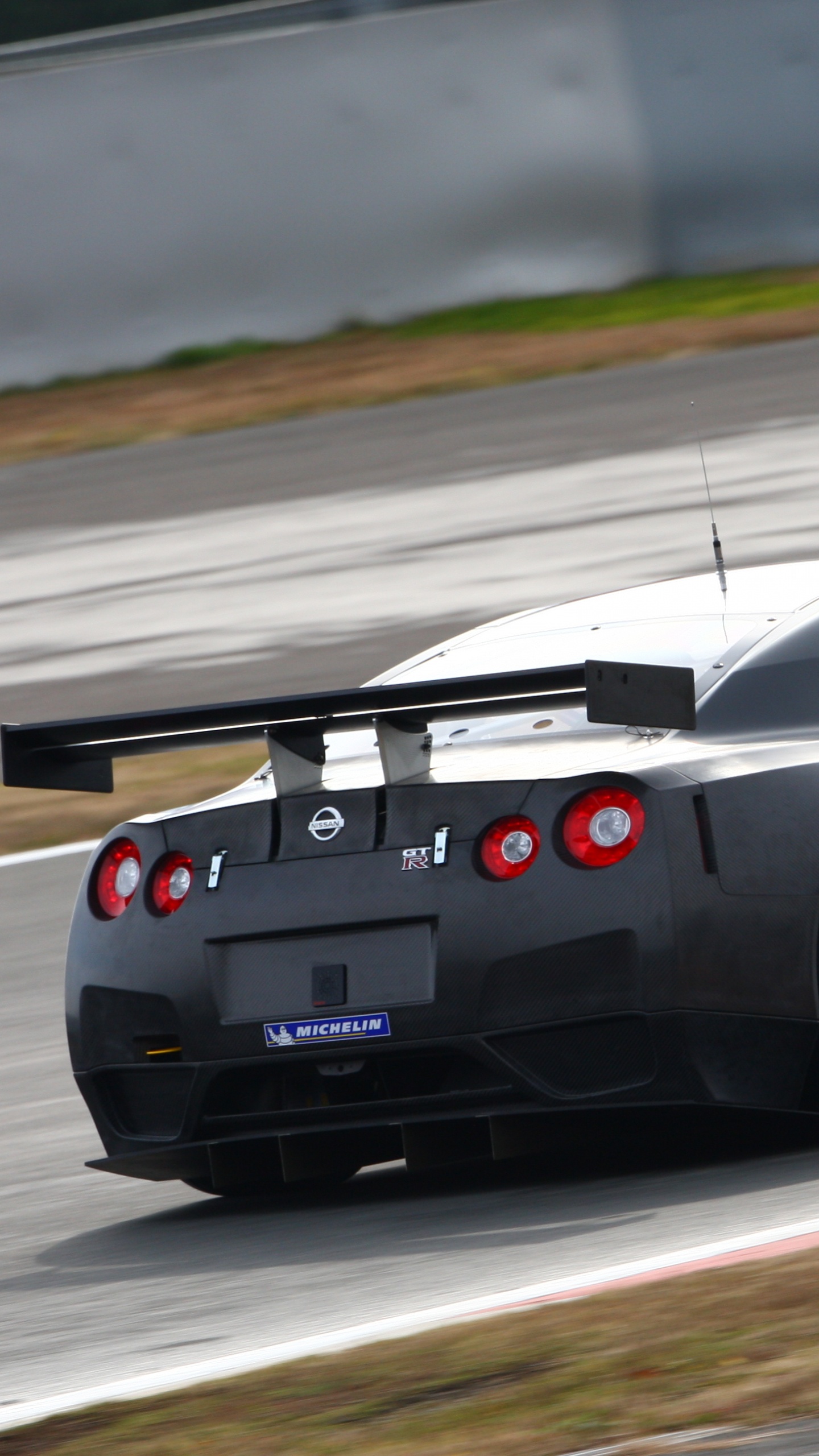 Black Porsche 911 on Road. Wallpaper in 1440x2560 Resolution