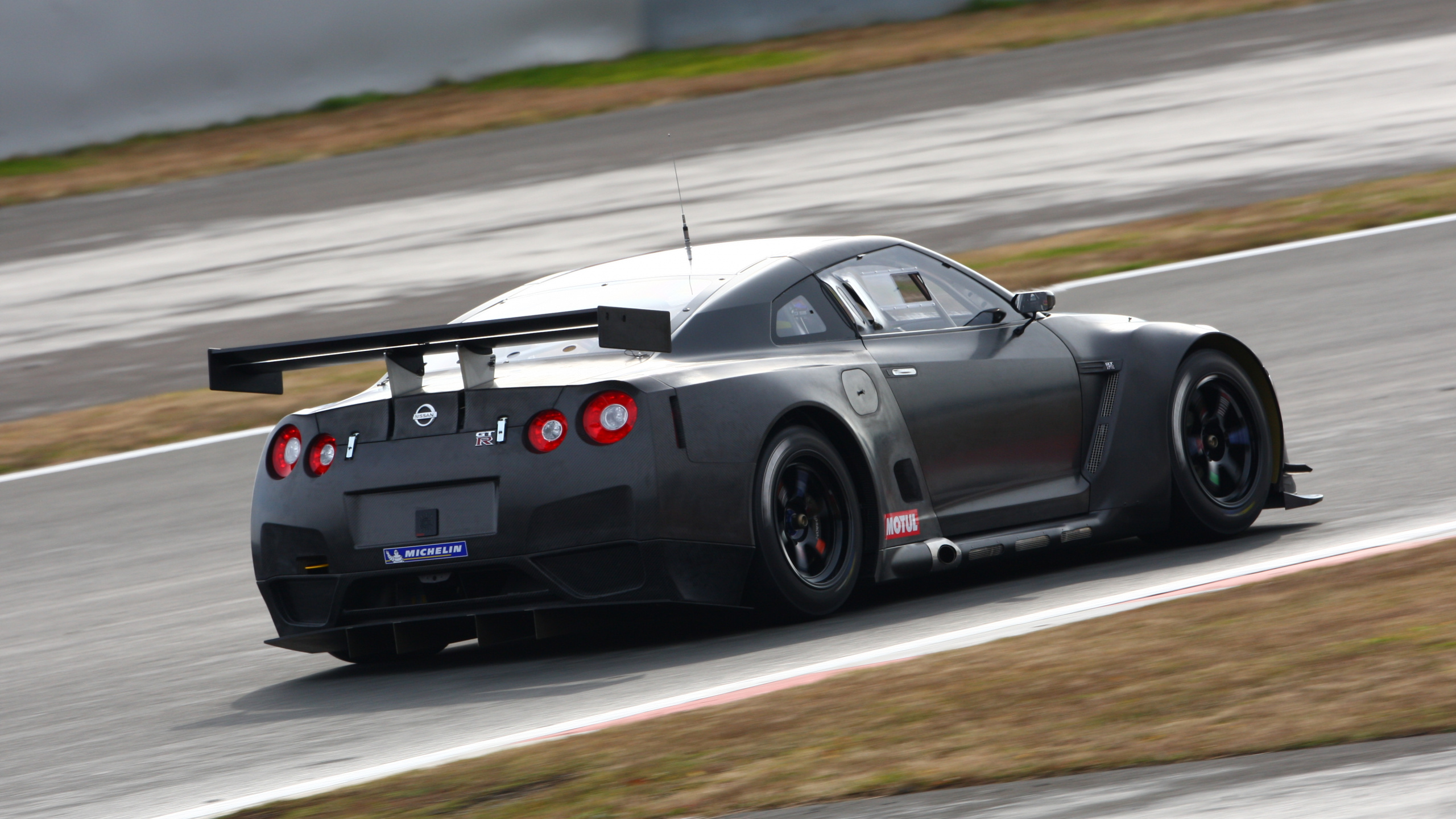 Black Porsche 911 on Road. Wallpaper in 2560x1440 Resolution