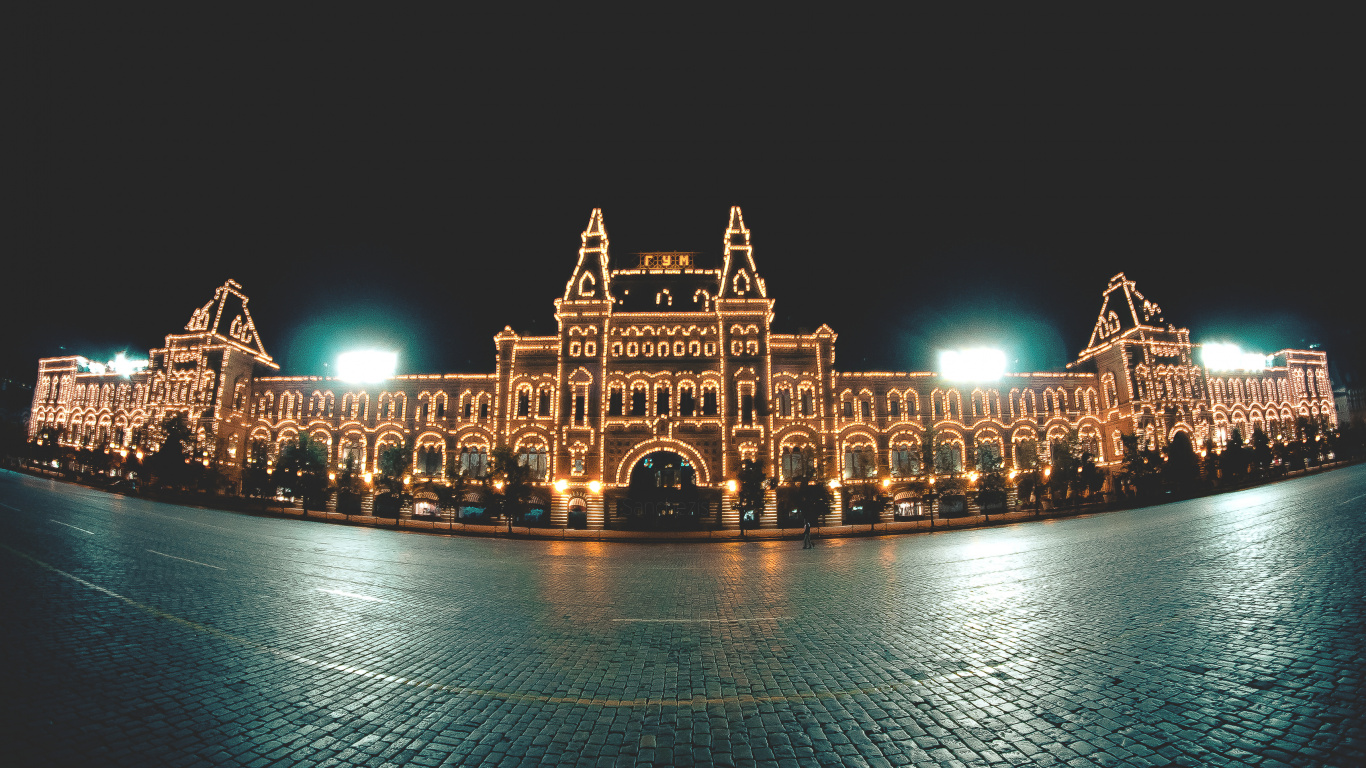 Edificio de Hormigón Marrón Durante la Noche. Wallpaper in 1366x768 Resolution