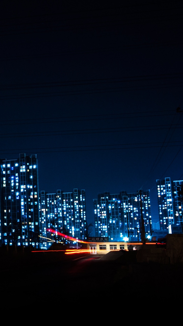 City Skyline During Night Time. Wallpaper in 720x1280 Resolution
