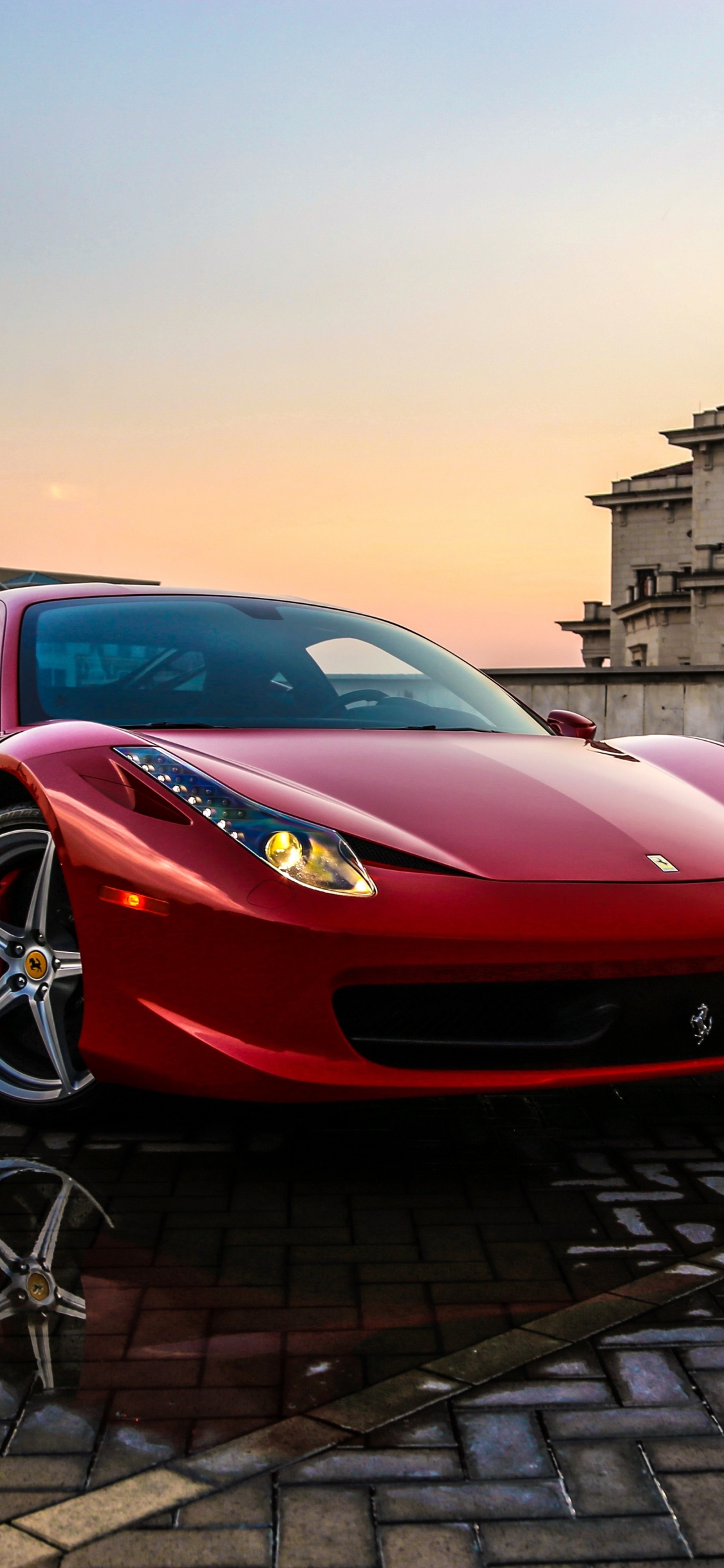 Coche Deportivo Ferrari Rojo Estacionado en la Calle Durante el Día. Wallpaper in 1125x2436 Resolution