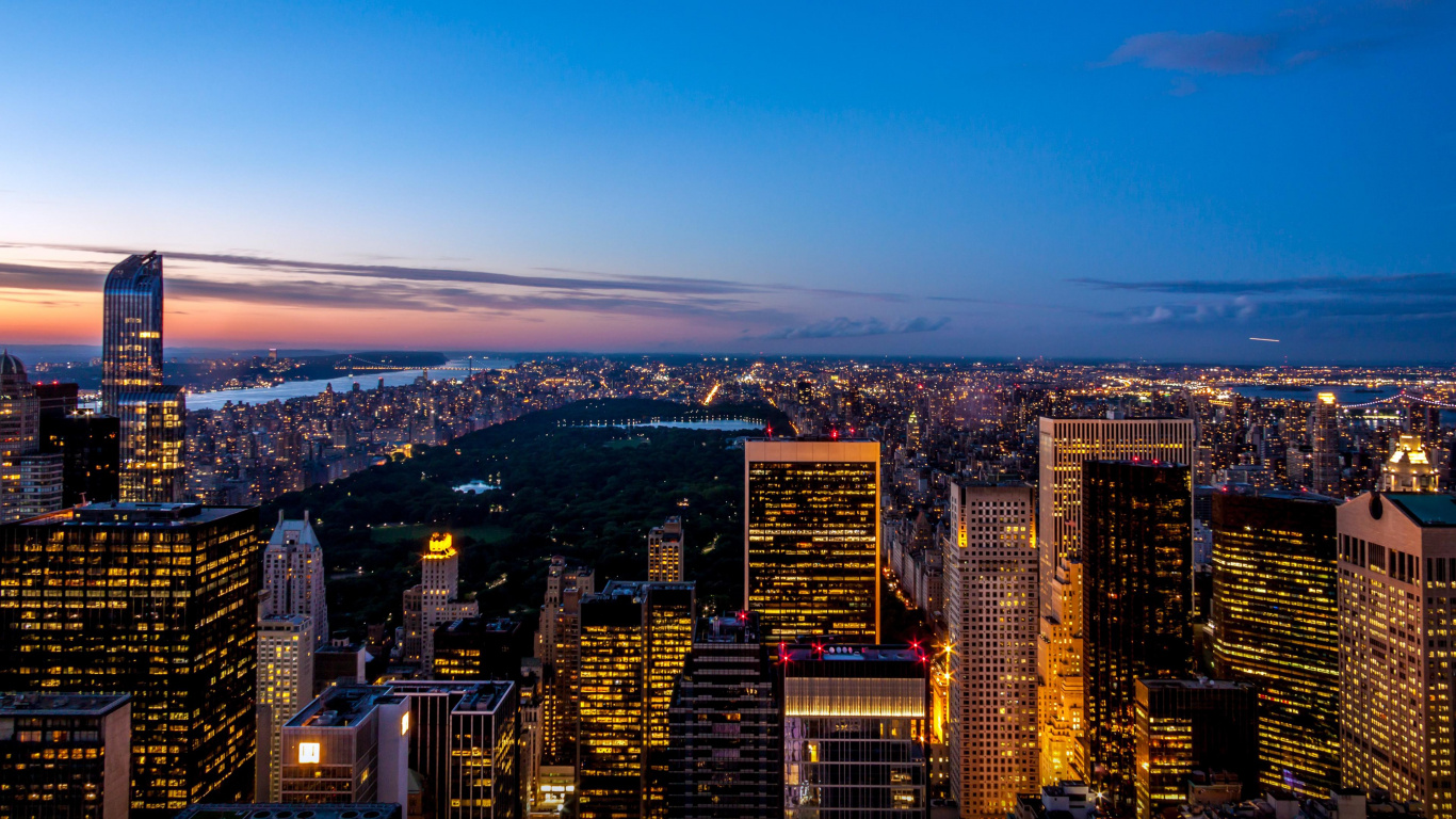 Aerial View of City Buildings During Night Time. Wallpaper in 1366x768 Resolution