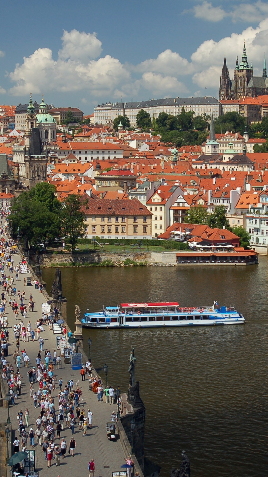 Red and White Boat on Water Near City Buildings During Daytime. Wallpaper in 1080x1920 Resolution