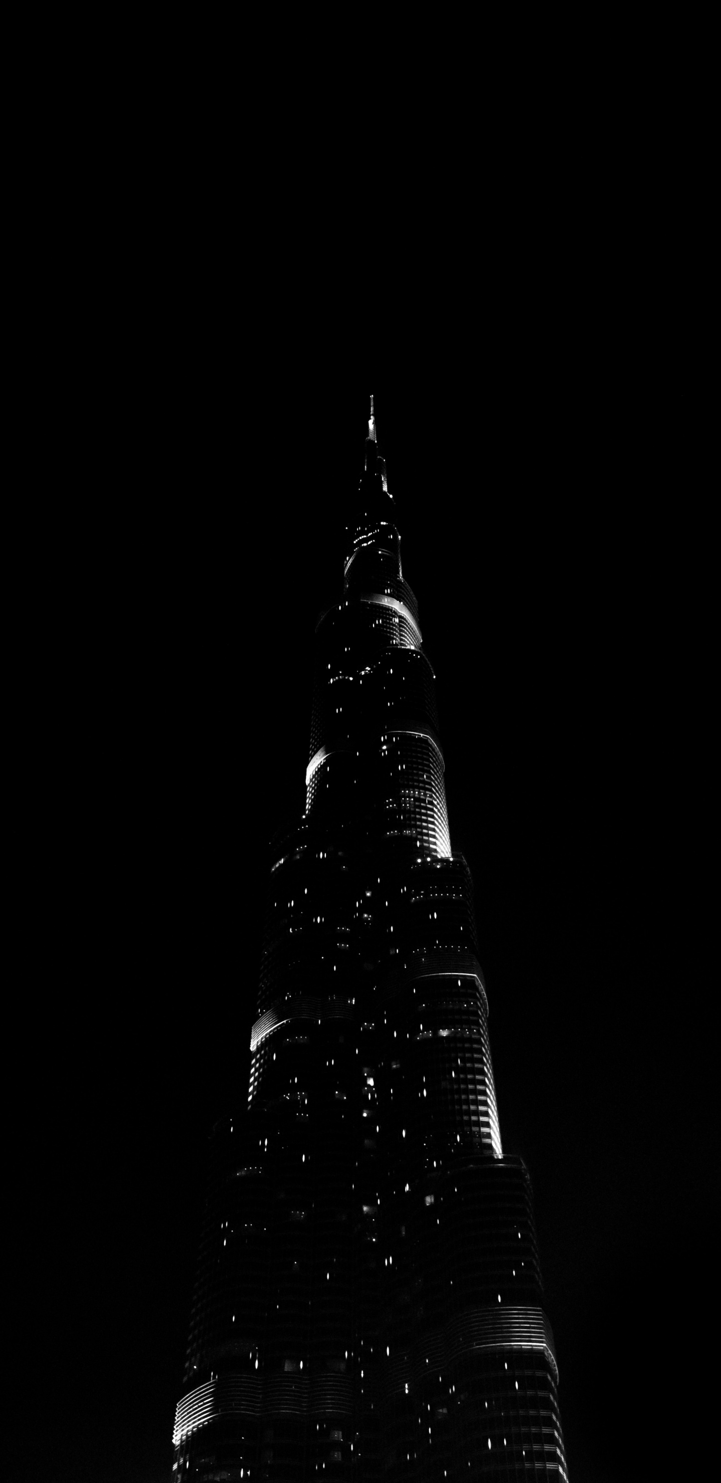 Black Tower With Lights During Night Time. Wallpaper in 1440x2960 Resolution