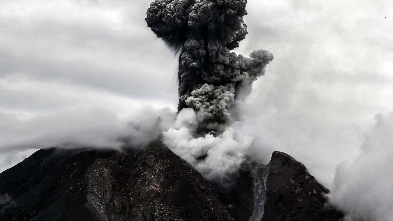 Black and White Clouds Over Mountain. Wallpaper in 1366x768 Resolution