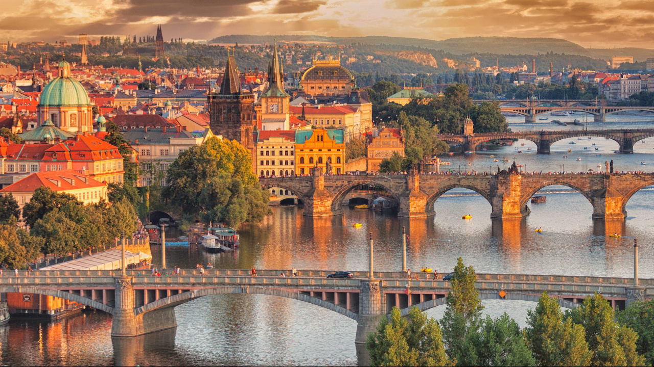 Brown Concrete Bridge Over River During Daytime. Wallpaper in 1280x720 Resolution