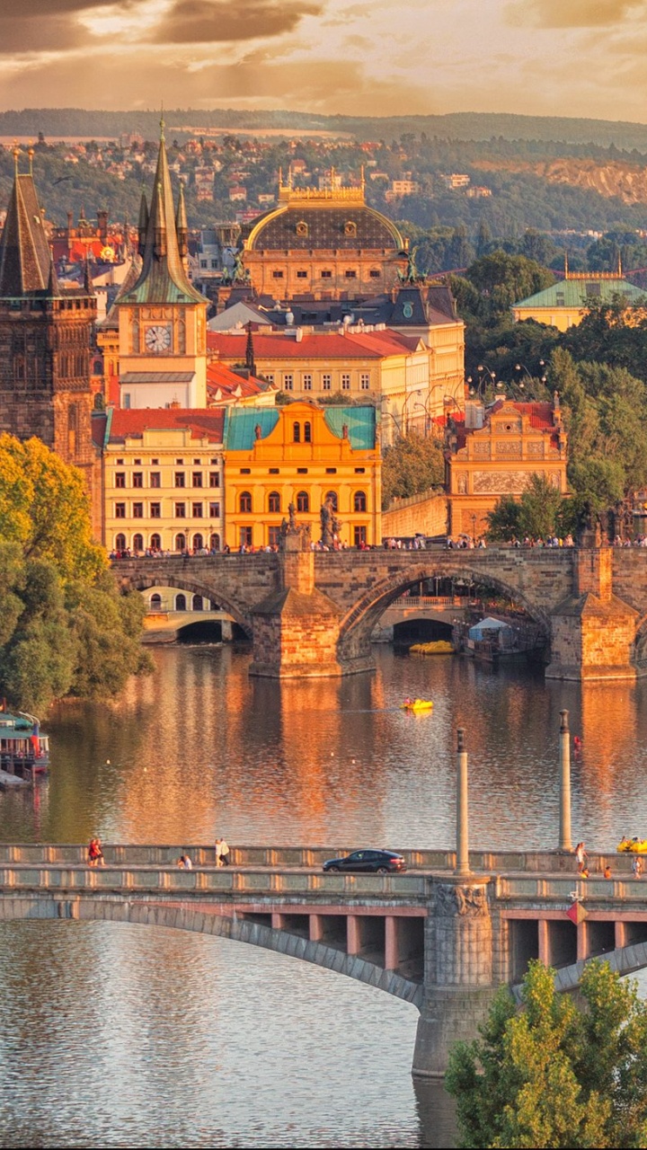 Brown Concrete Bridge Over River During Daytime. Wallpaper in 720x1280 Resolution