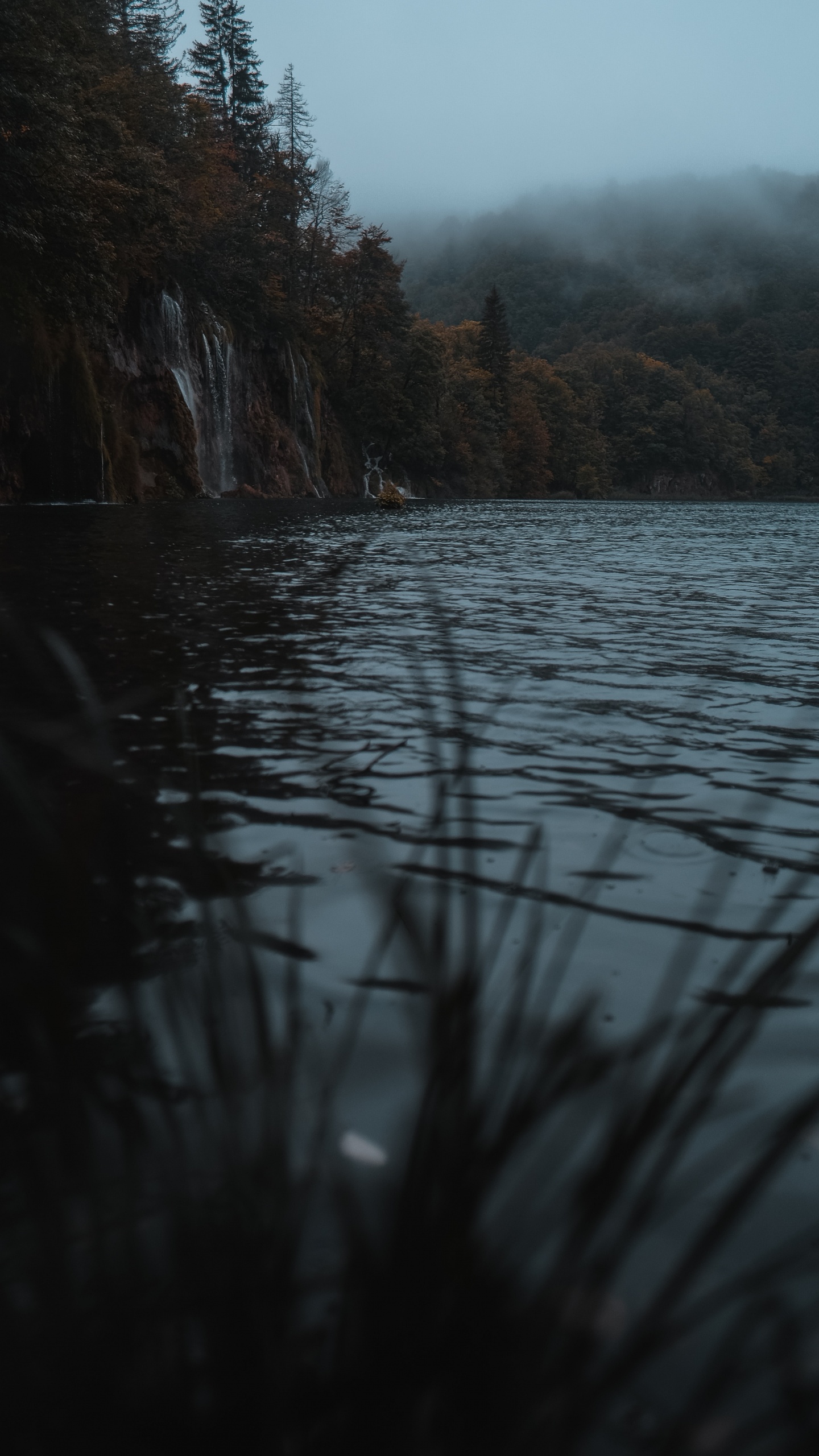 Body of Water Near Mountain During Daytime. Wallpaper in 1440x2560 Resolution