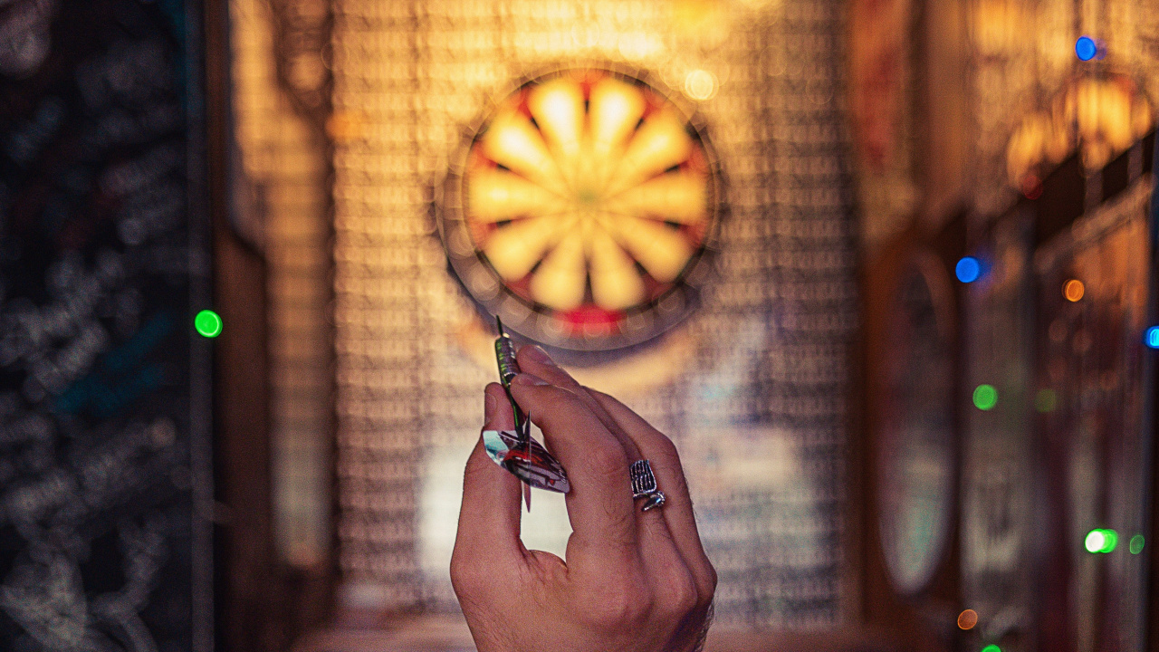 Person Holding Lighted Jack o Lantern. Wallpaper in 1280x720 Resolution