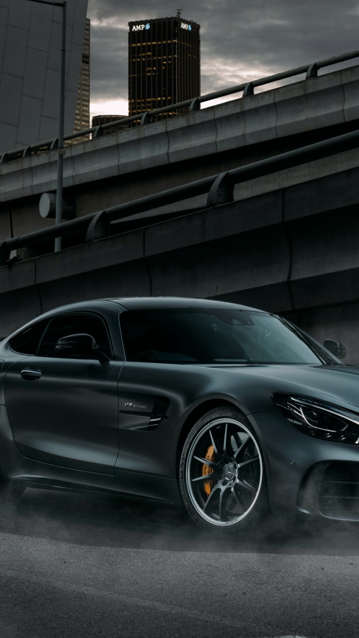 Black Mercedes Benz Coupe Parked on Gray Concrete Road During Daytime. Wallpaper in 720x1280 Resolution