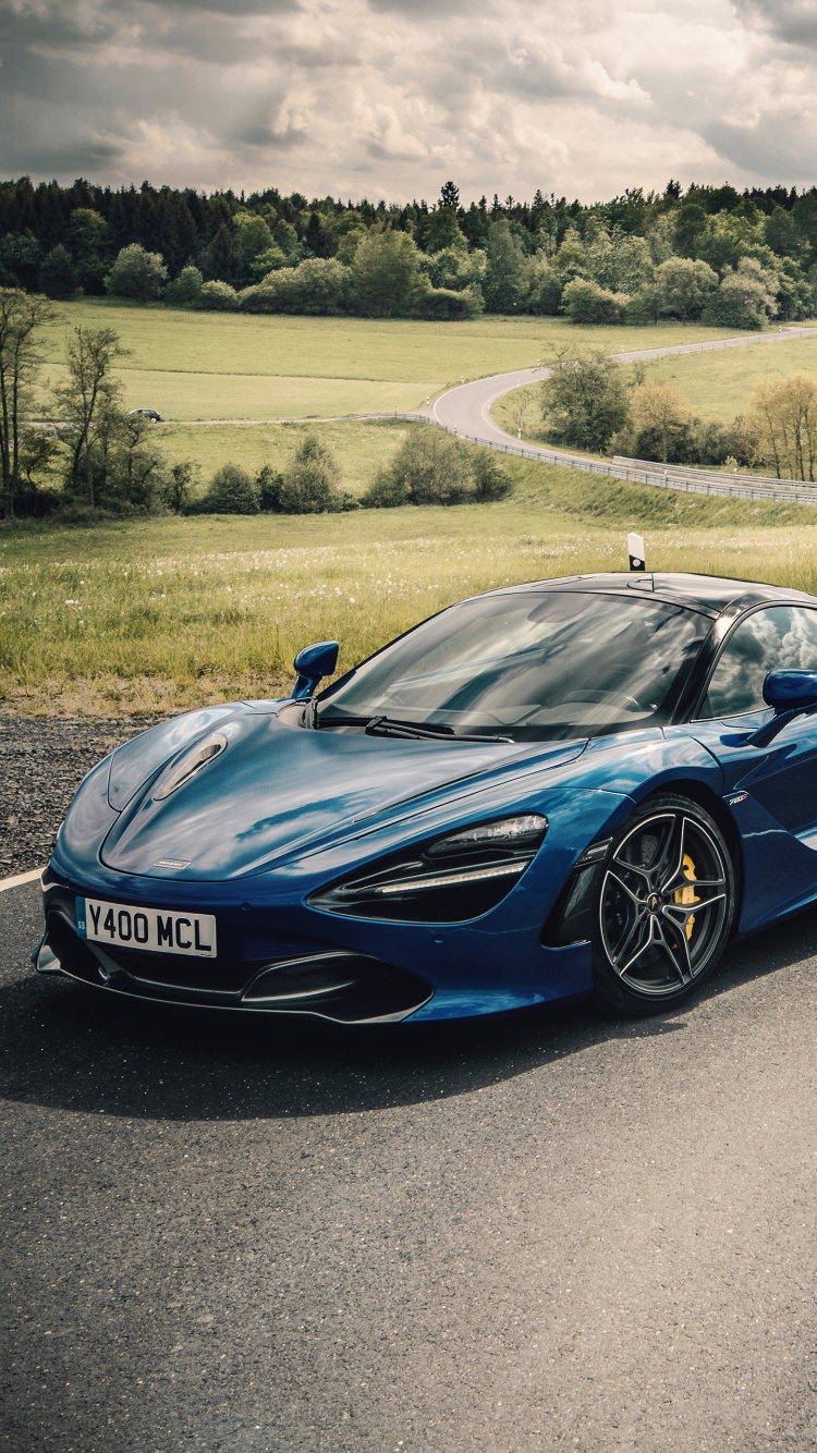 Blue Porsche 911 on Road During Daytime. Wallpaper in 750x1334 Resolution