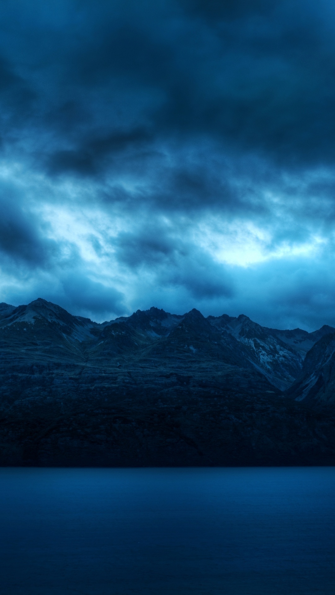 Black and White Mountains Under Gray Clouds. Wallpaper in 1080x1920 Resolution