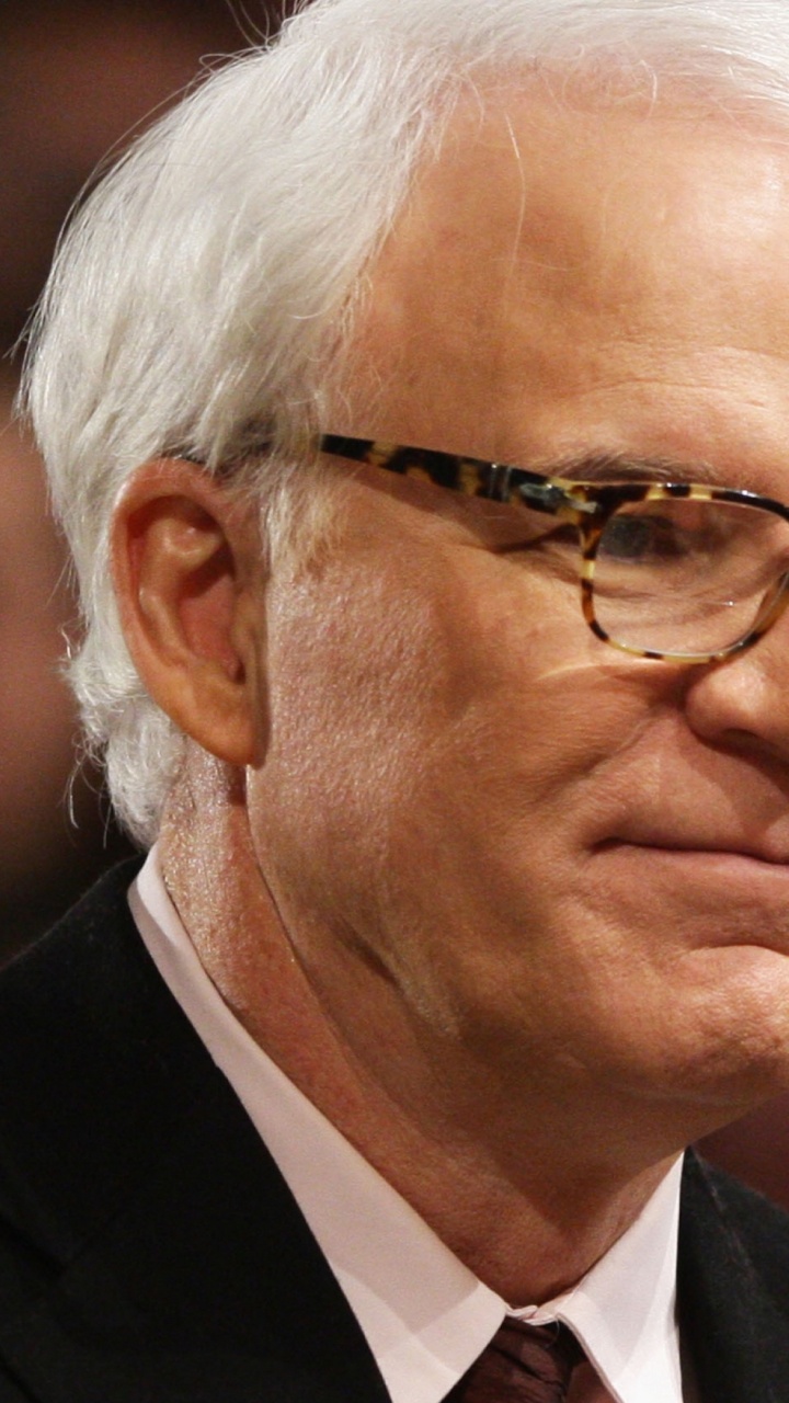 Hombre de Traje Negro Con Anteojos. Wallpaper in 720x1280 Resolution