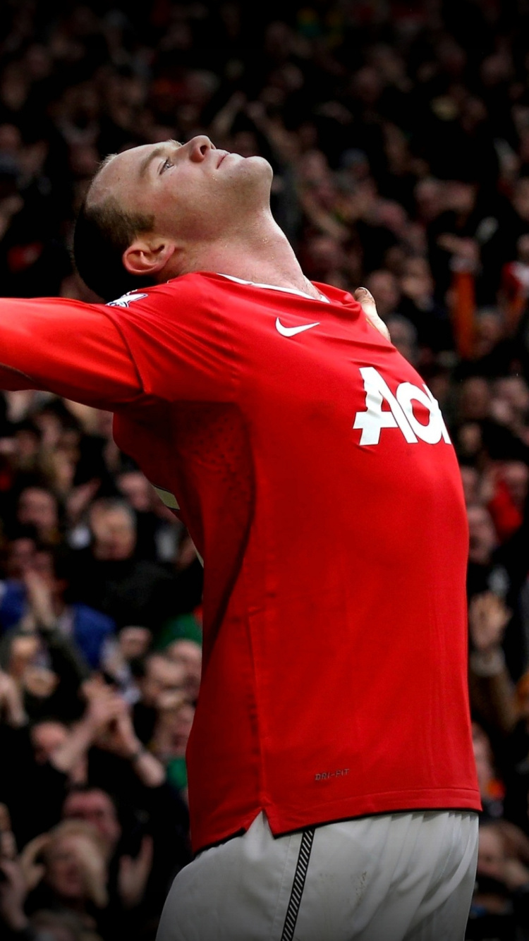 Man in Red Nike Crew Neck T-shirt and Blue Shorts. Wallpaper in 750x1334 Resolution