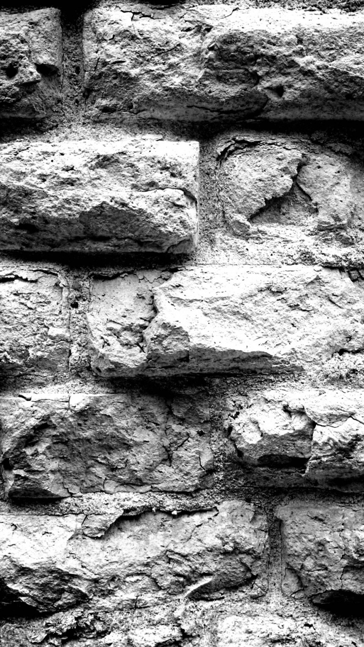 Photo en Niveaux de Gris D'un Mur de Briques. Wallpaper in 750x1334 Resolution