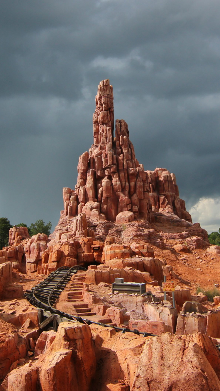 Brown Rock Formation Under Cloudy Sky During Daytime. Wallpaper in 750x1334 Resolution