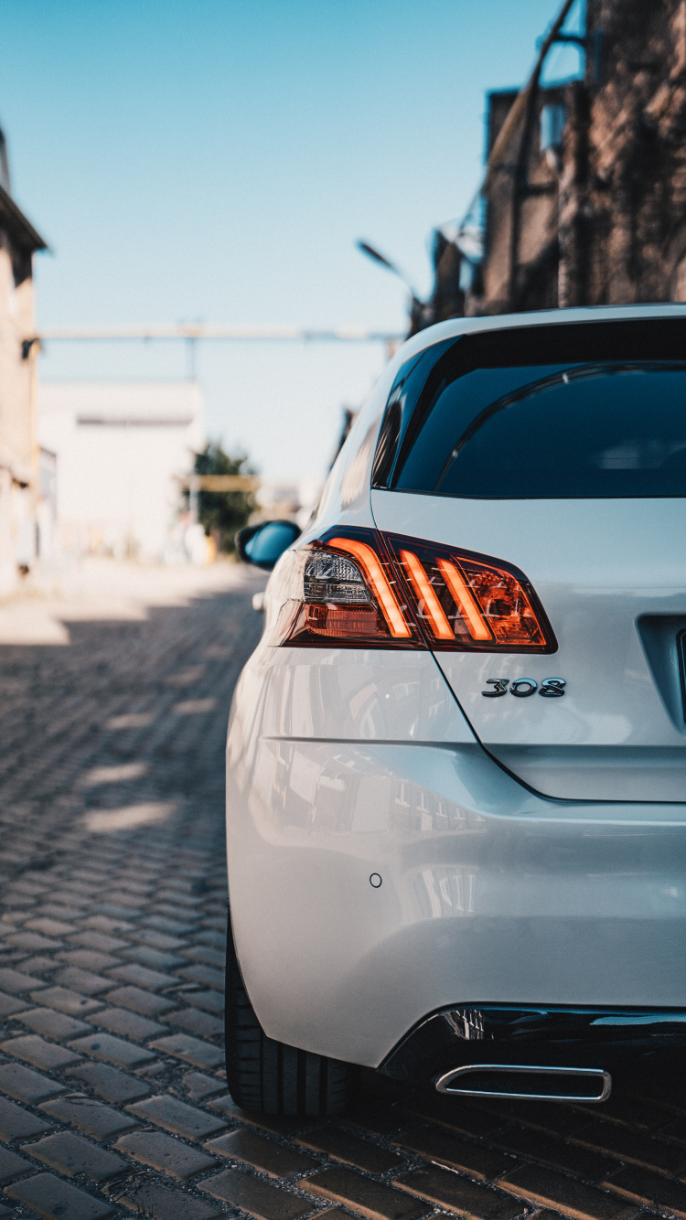 White Car on Road During Daytime. Wallpaper in 750x1334 Resolution